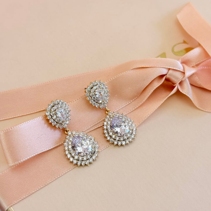 Double teardrop zircone gold plated earrings