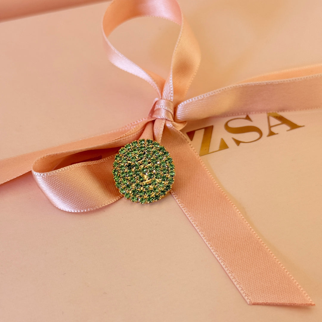 Round light green preciosa crystals gold plated brooch