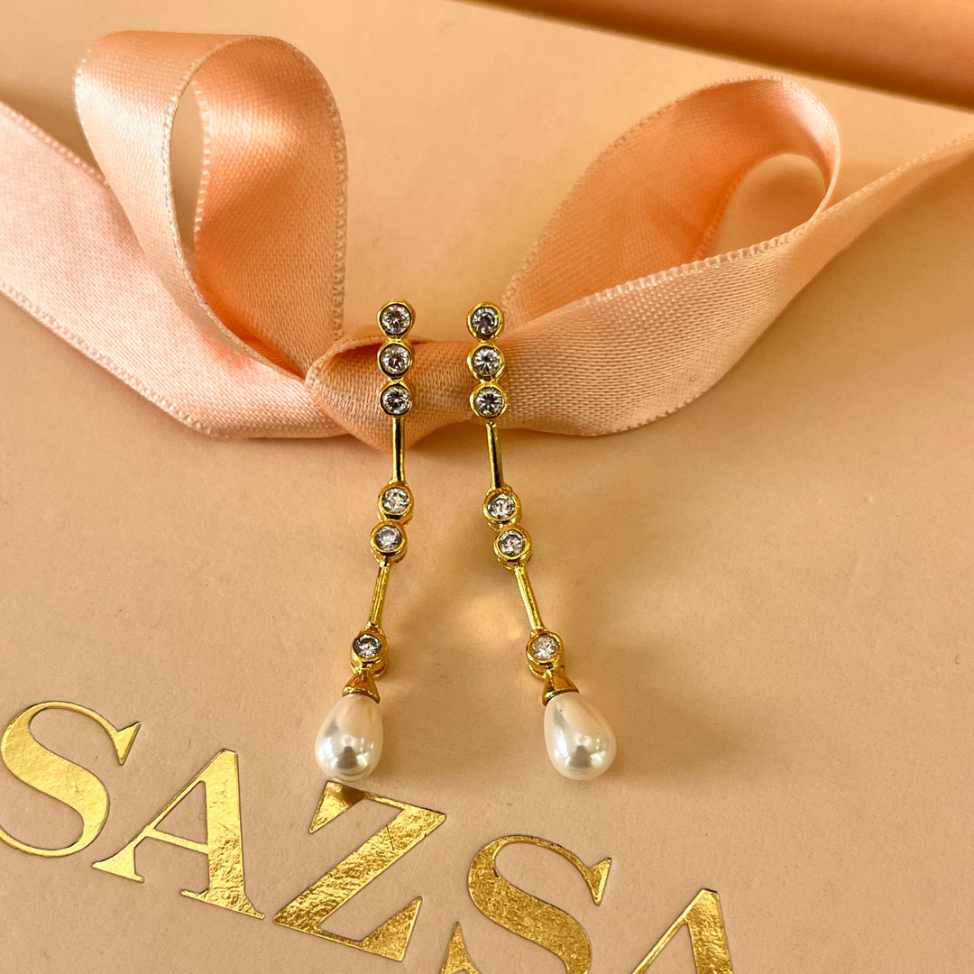 Zircone and white pearls gold plated earrings