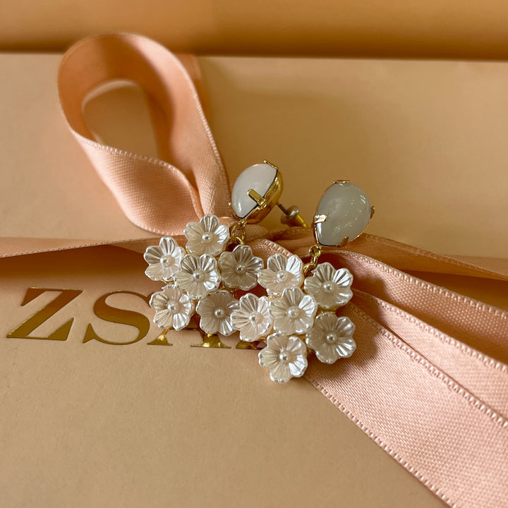 White flowers gold plated earrings