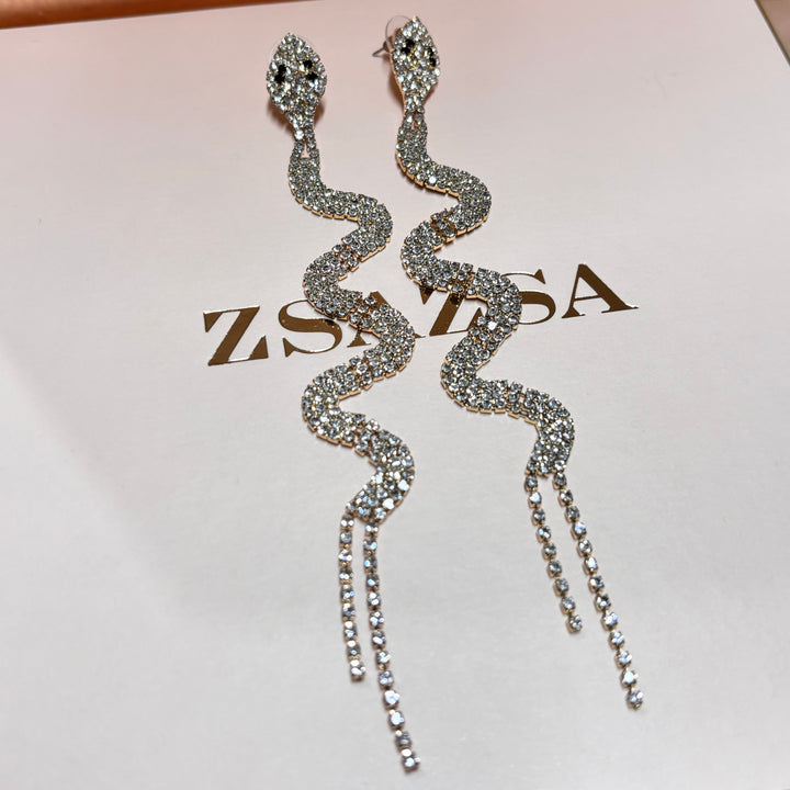 Elegant black gold snake earrings