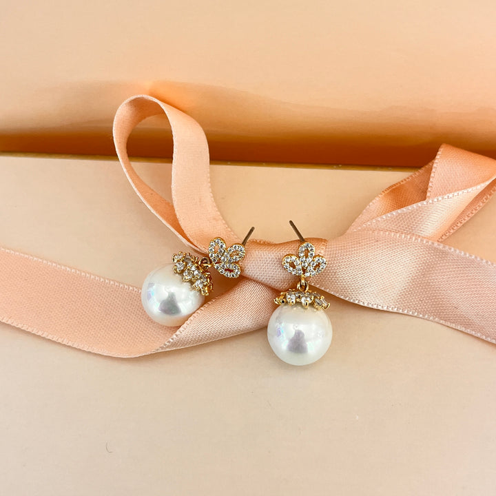 Zircone and white pearls gold plated earrings