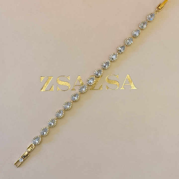 Teardrop zircone gold plated earrings and bracelet