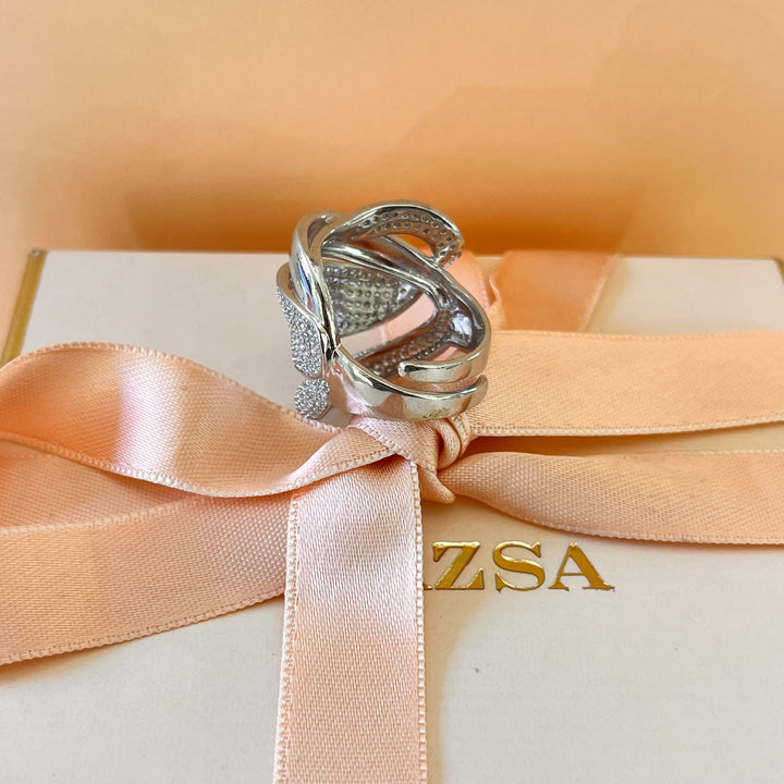 Zircone white gold plated crossed chunky ring