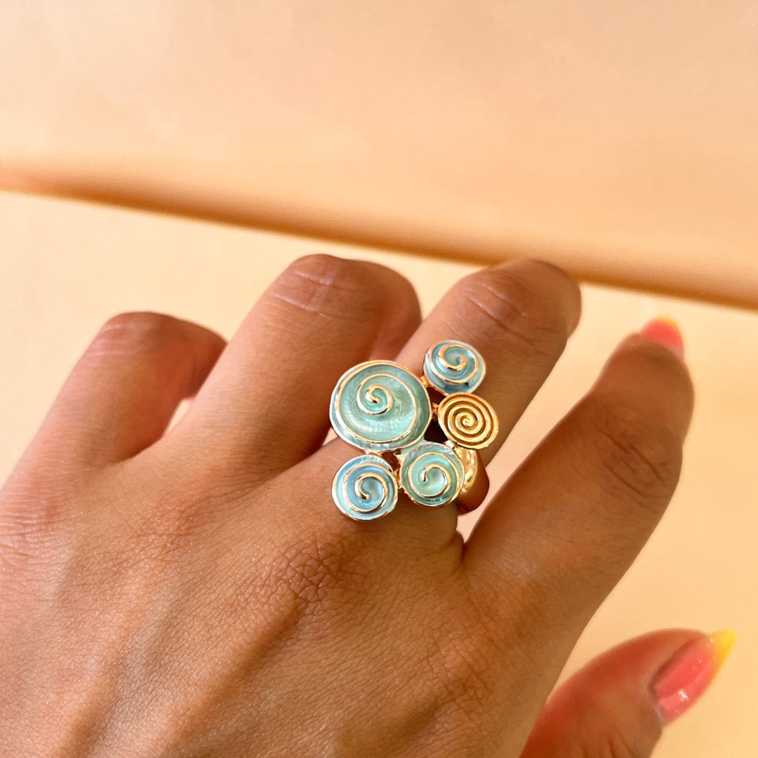 Enamel light blue, light turquoise and gold spiral rose gold plated set