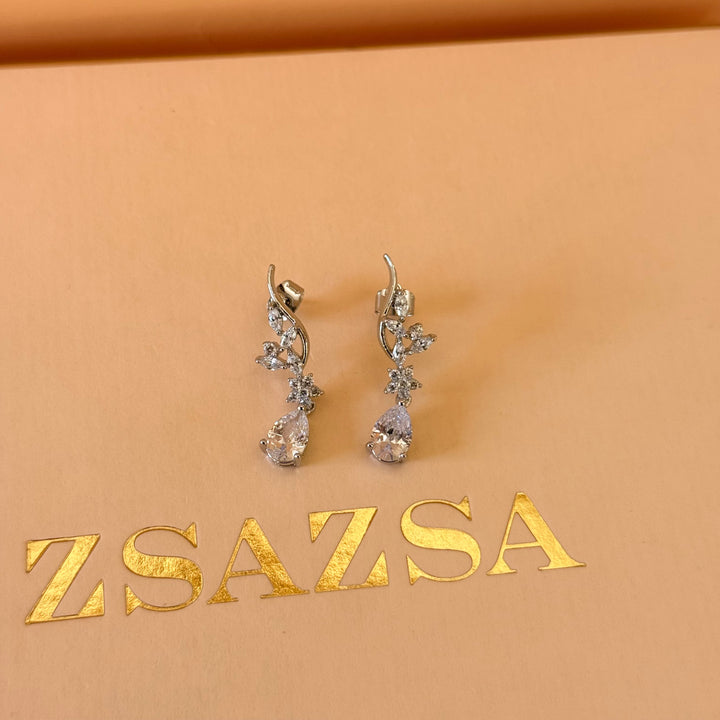 Teardrop and flower zircone silver earrings and bracelet