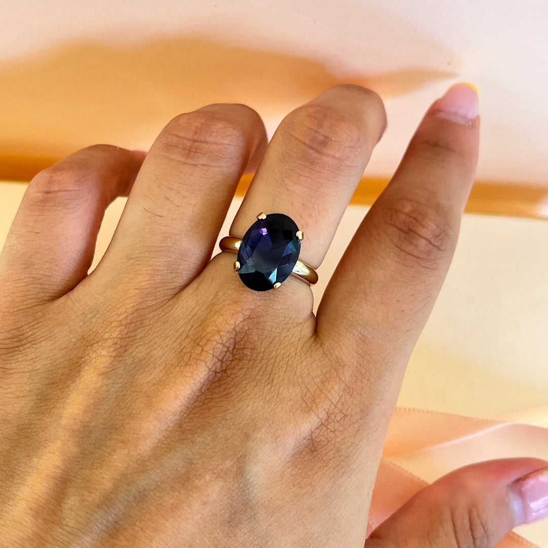 Dark purple oval preciosa crystals ring