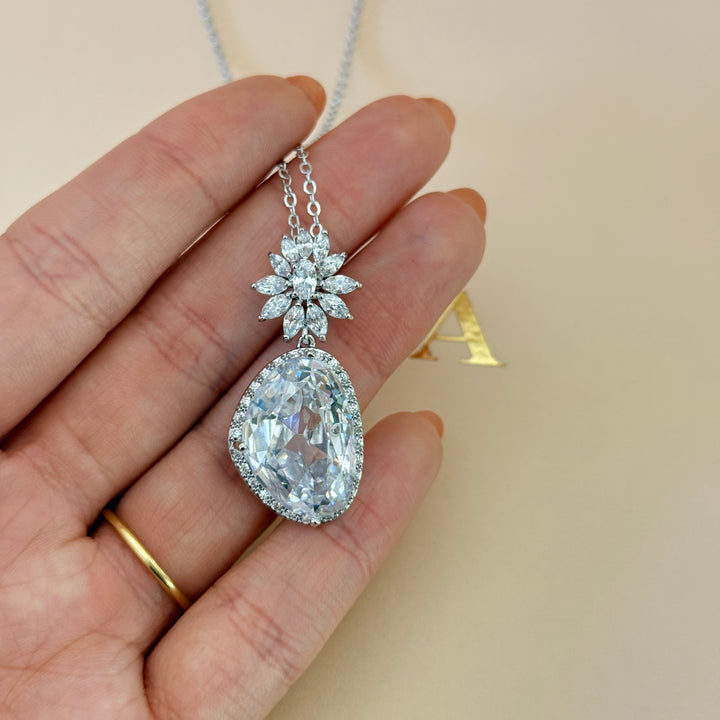 Asymmetric zircone silver pendant