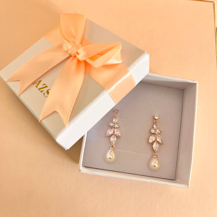 Zircone and pearl rose gold plated earrings