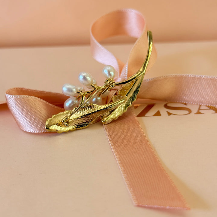 Pearls and green leaves gold plated brooch
