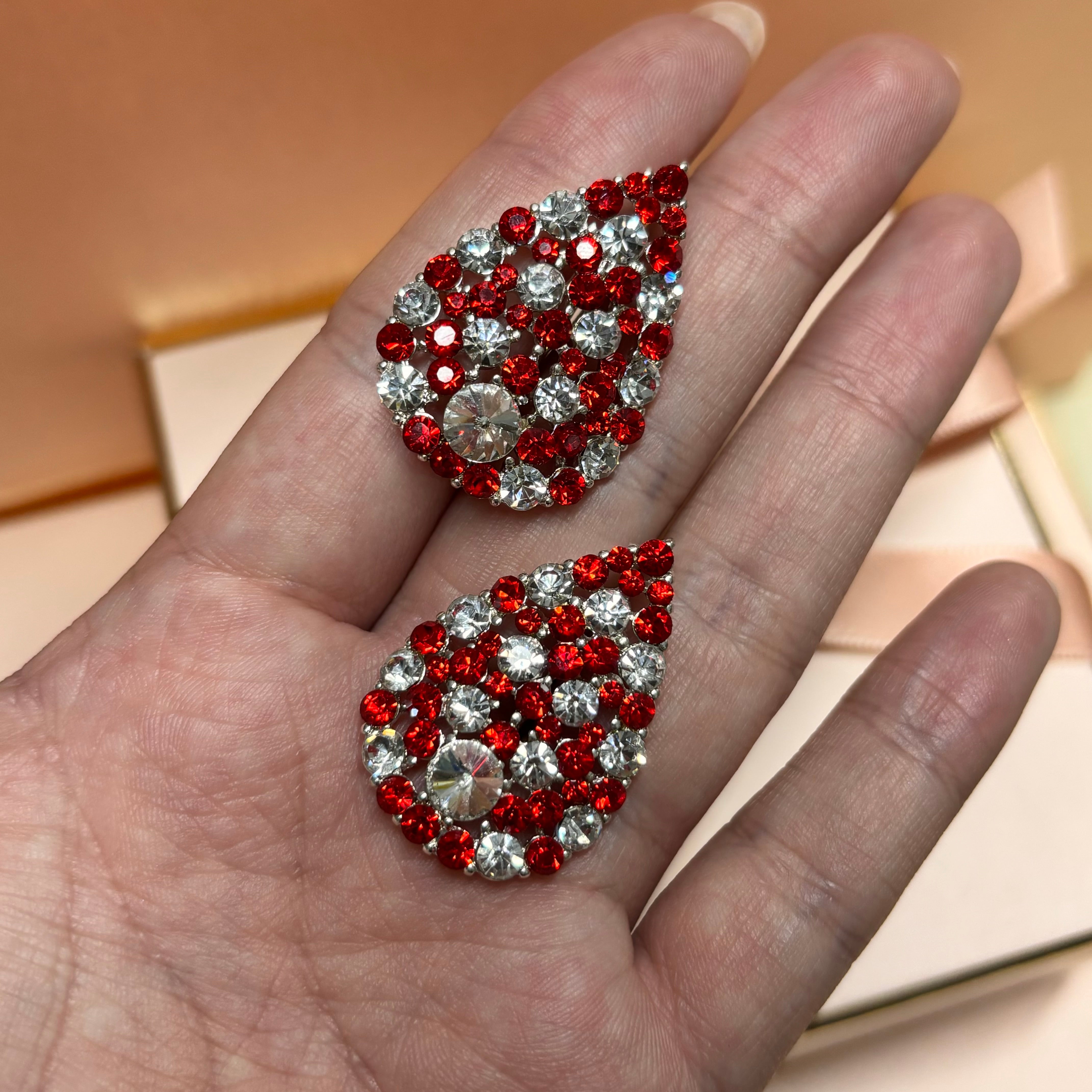 Red stud earrings