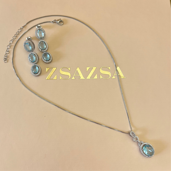 Turquoise oval zircone set
