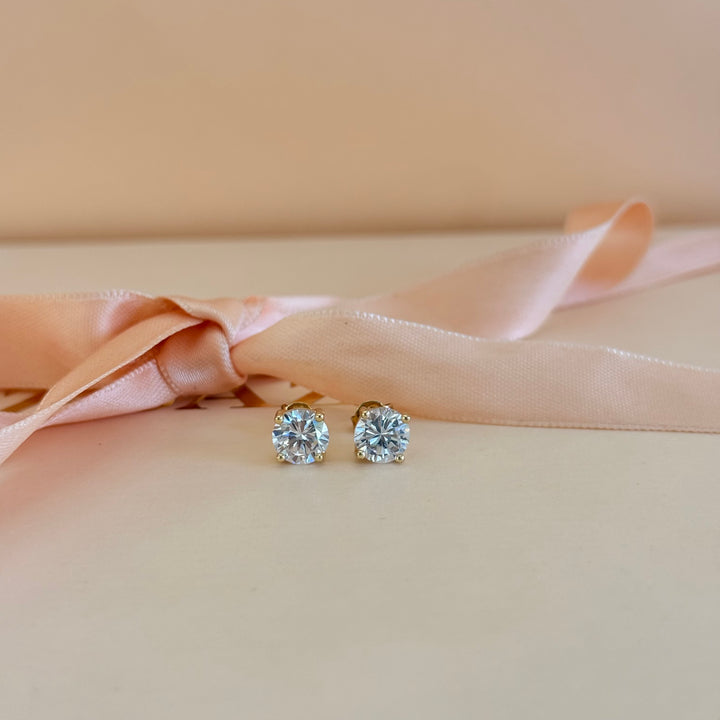 Small size zircone solitaire gold plated earrings