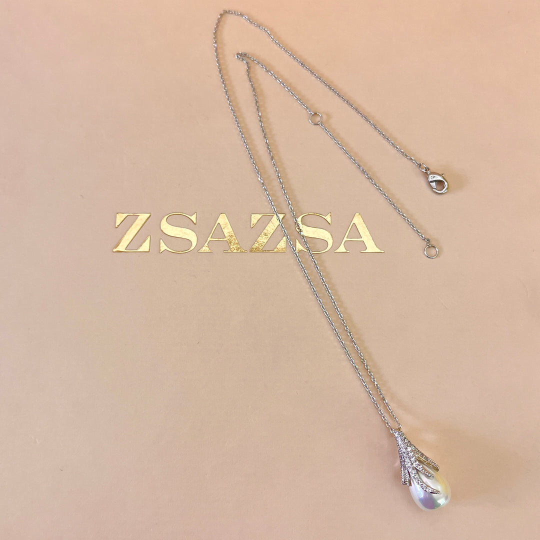 Zircone and white pearls white gold plated set