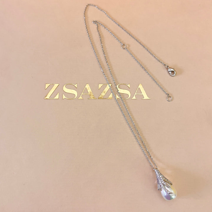 Zircone and white pearls white gold plated set