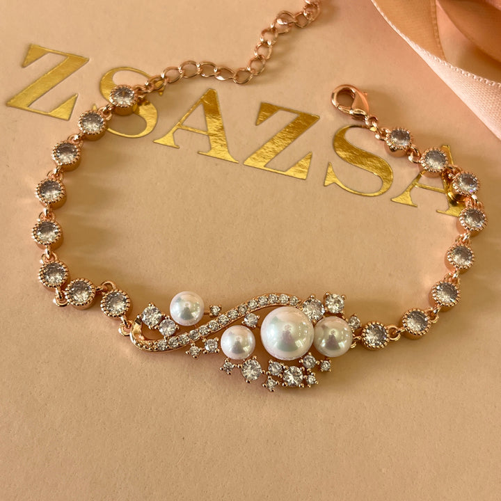 Zircone and white pearls rose gold plated bracelet