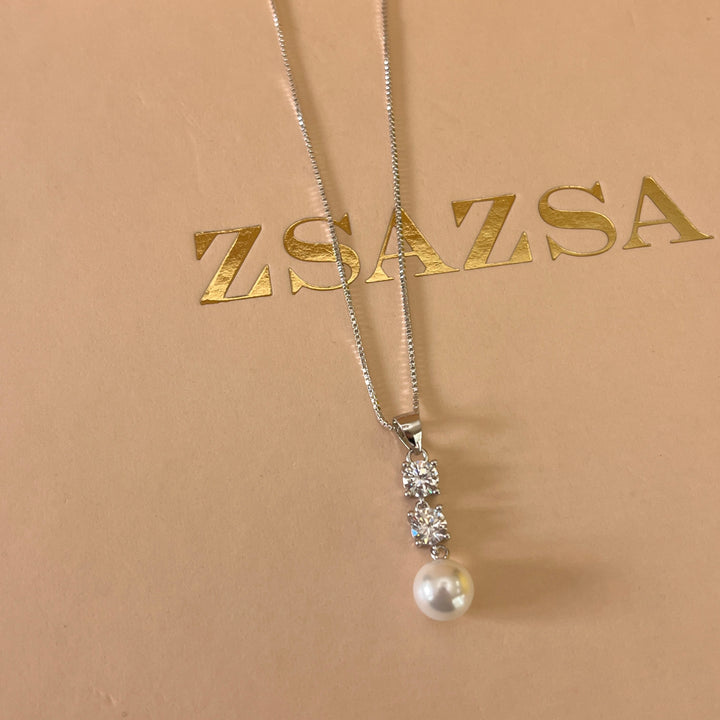 Zircone and white pearls sterling silver set