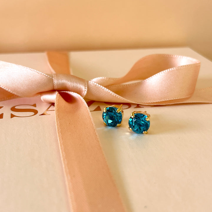 Solitaire turquoise Swarovski crystals studs
