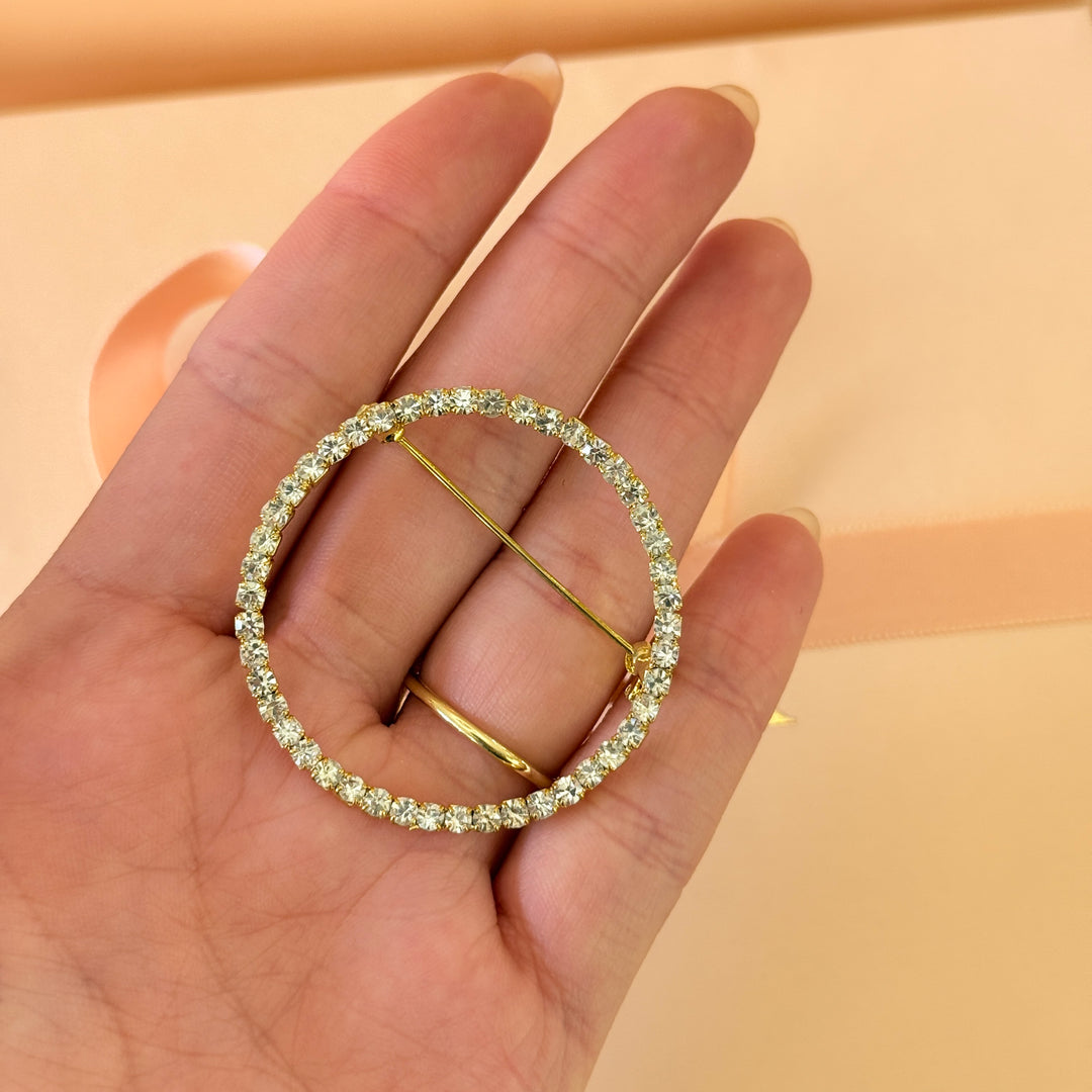 Round rhinestone gold plated brooch