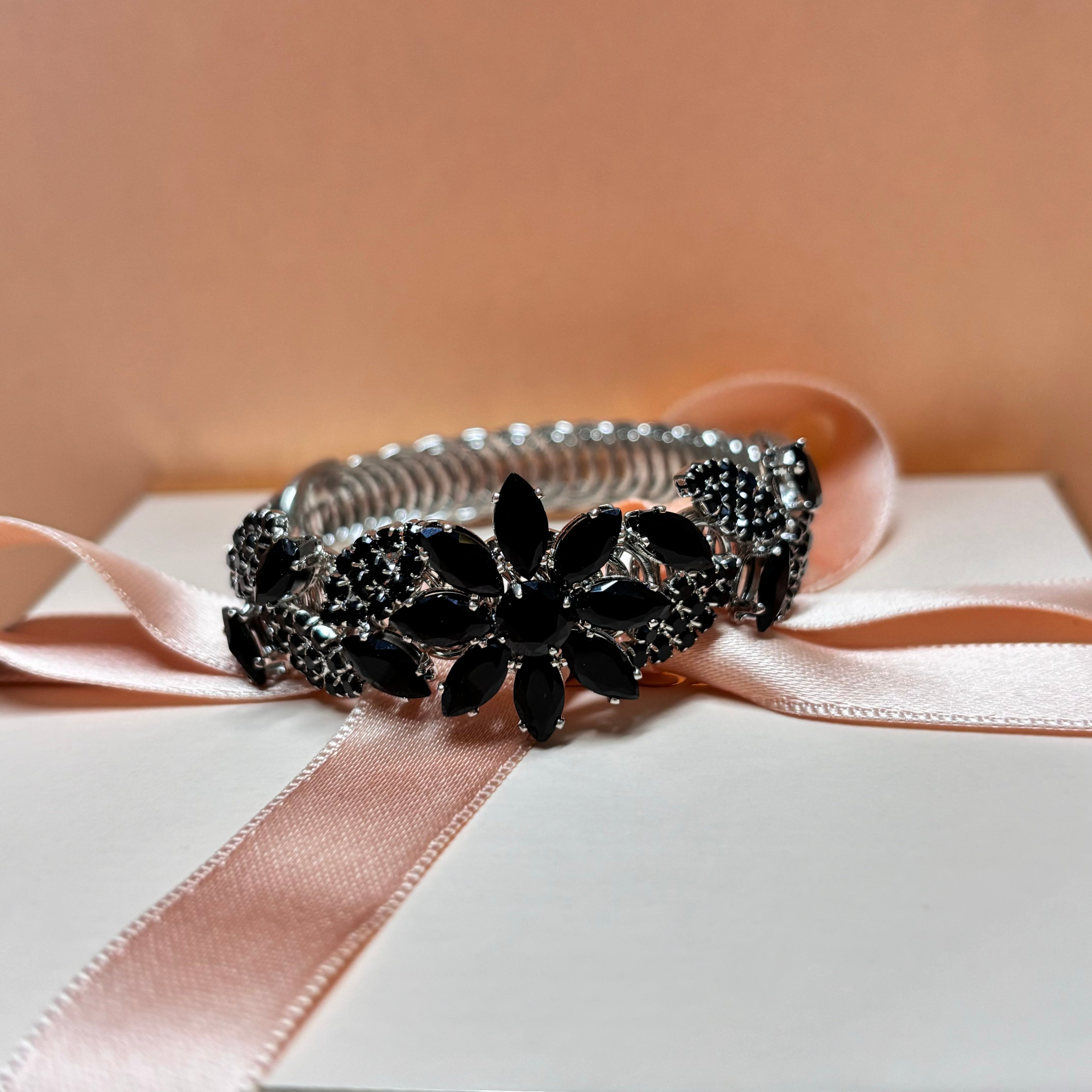 Elegant black flower bangle