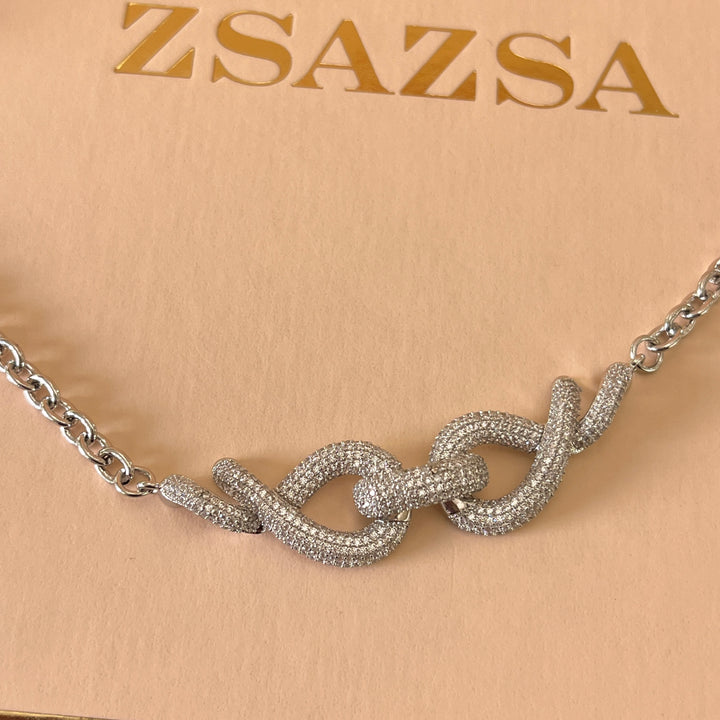 Silver zircone twisted set