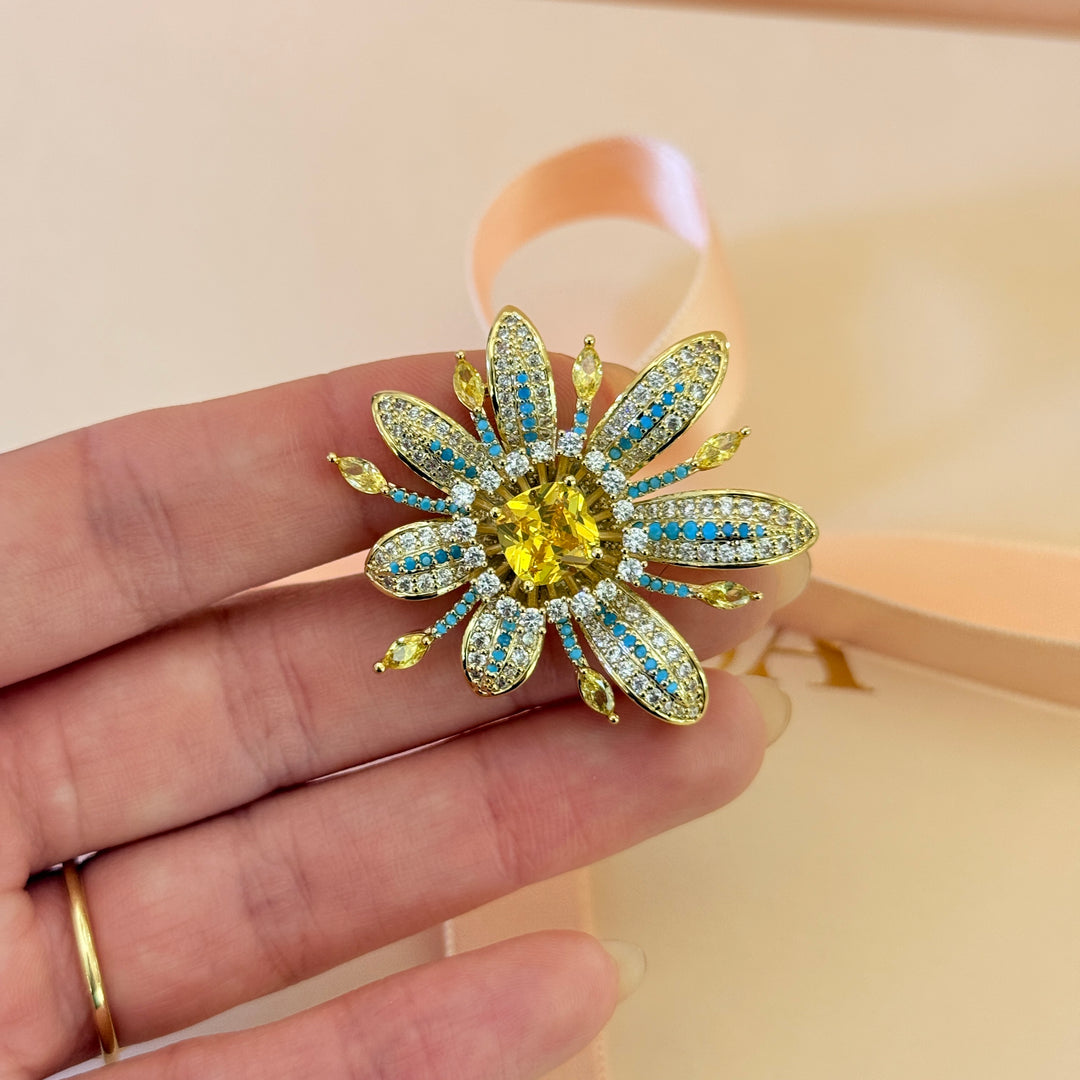 Yellow and turquoise zircone gold plated brooch