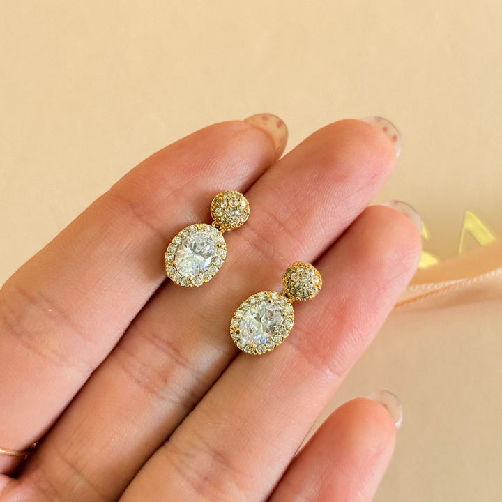 Round and oval dangle zircone gold plated earrings