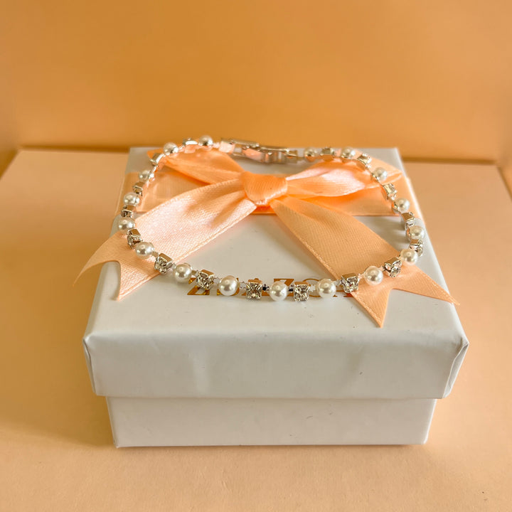 Peal and rhinestone white gold plated bracelet