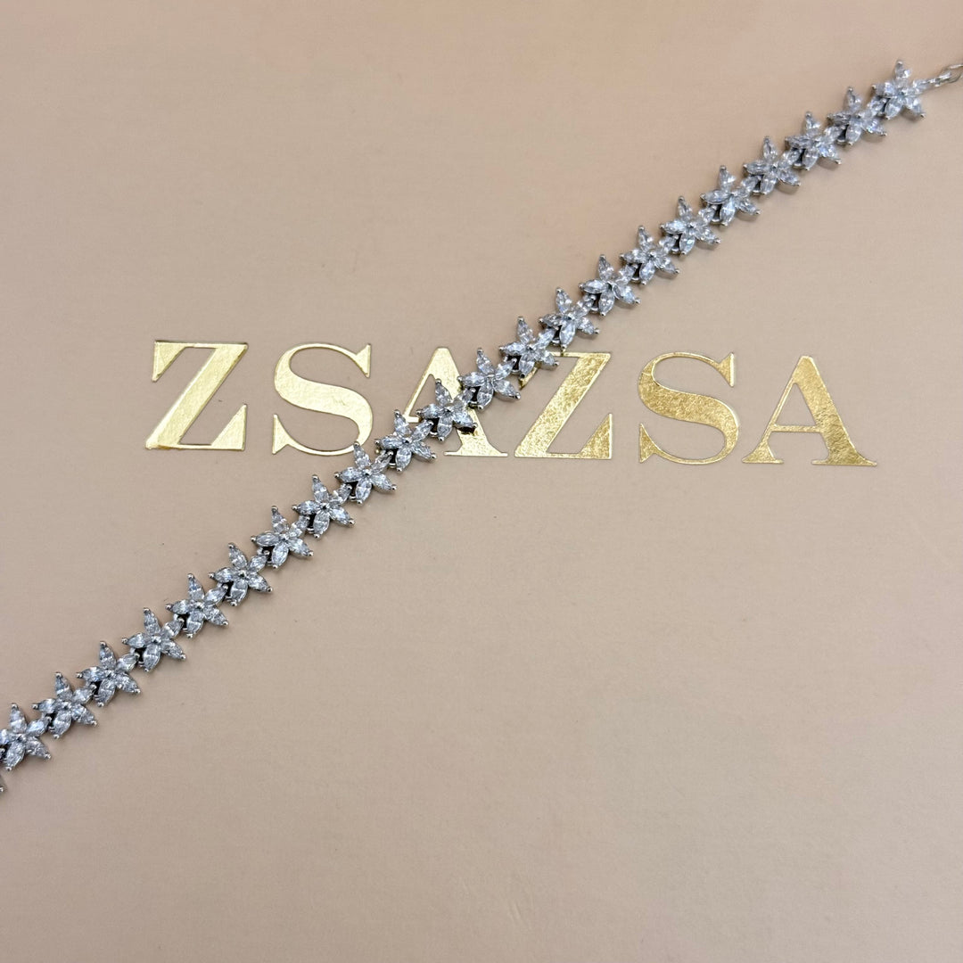 Dainty flower zircone silver earrings and bracelet