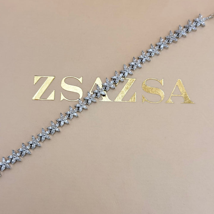 Dainty flower zircone silver earrings and bracelet