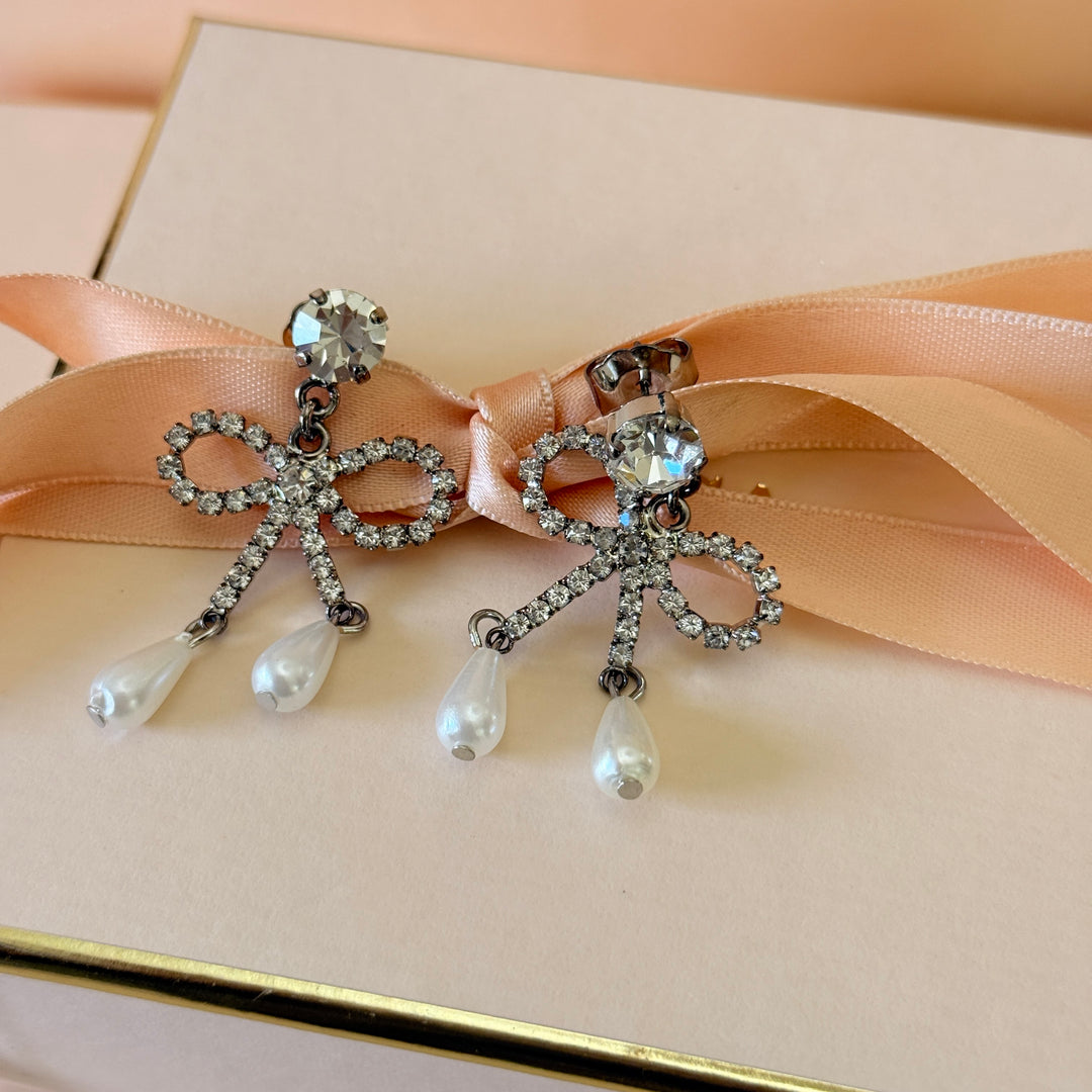 Swarovski crystals bow drop pearls silver earrings