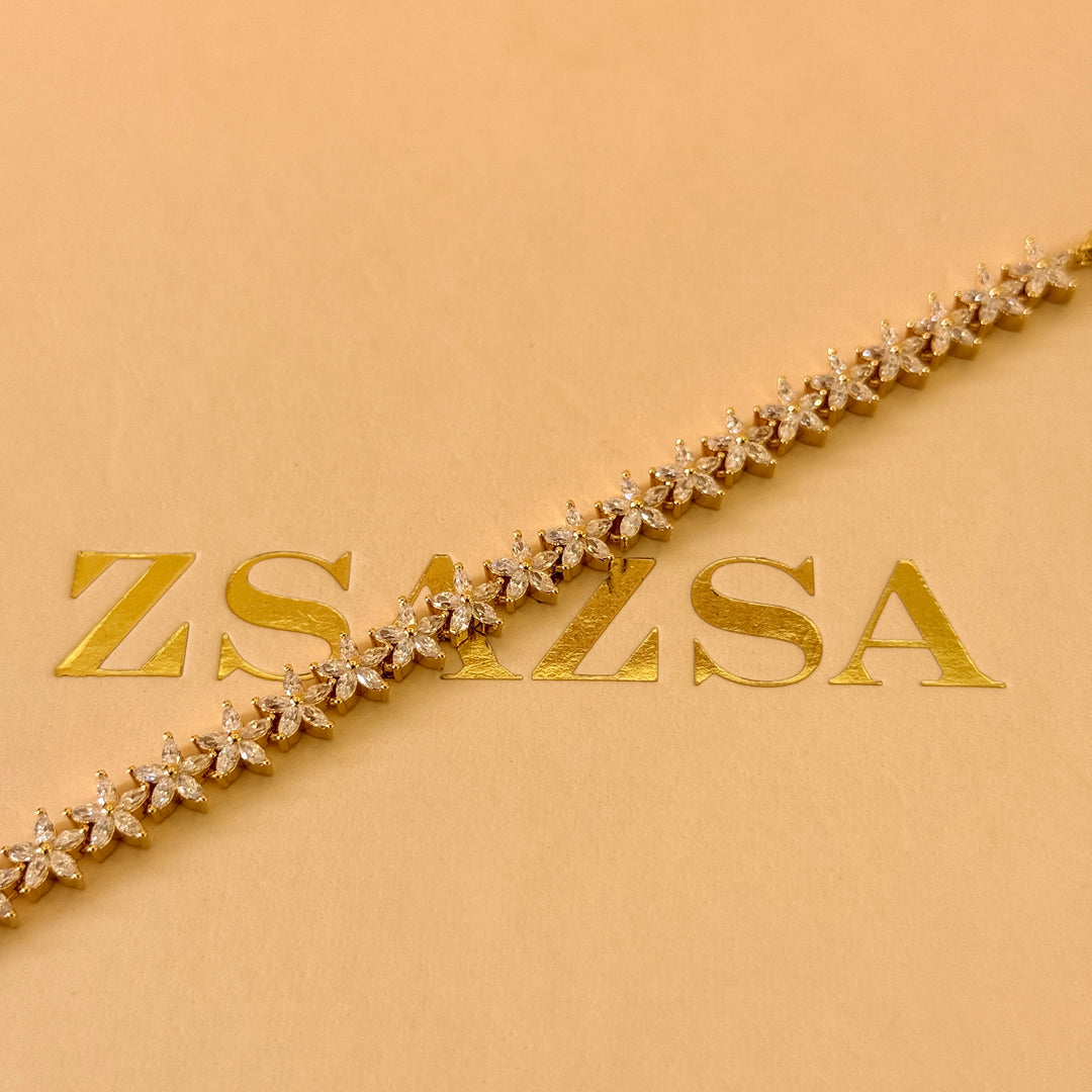 Dainty flowers zircone gold plated earrings and bracelet