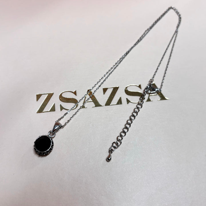 Dainty black silver pendant