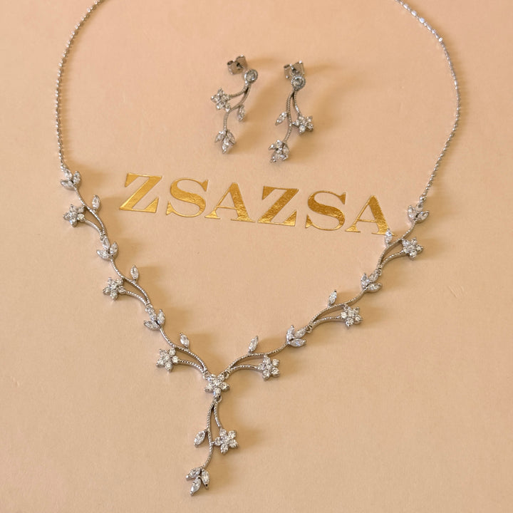 Flower and leaves zircone silver set