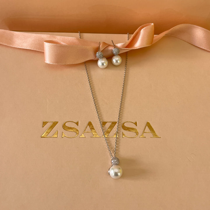 Zircone and white pearls white gold plated set