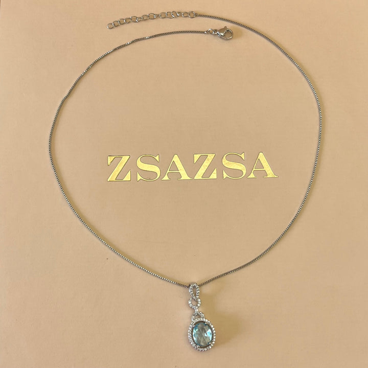 Turquoise oval zircone set