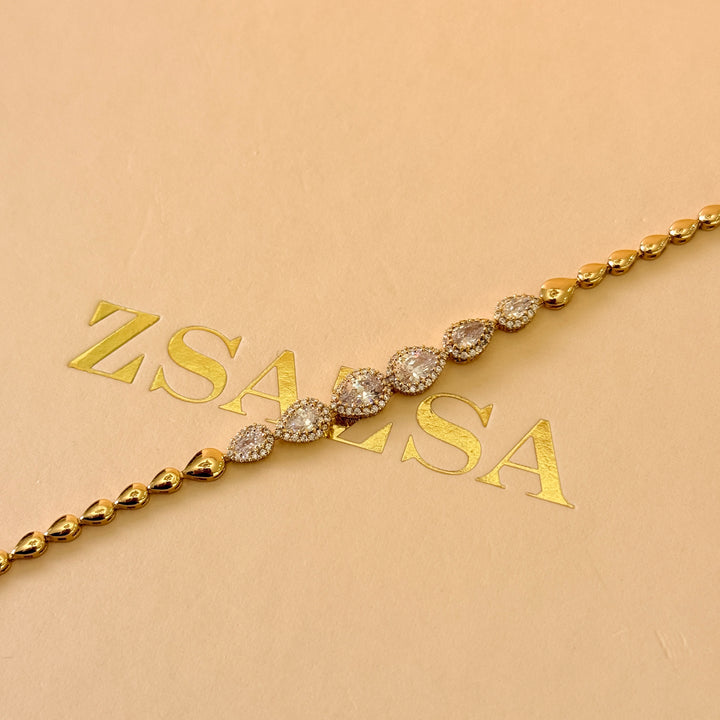 Teardrop zircone gold plated earrings and bracelet