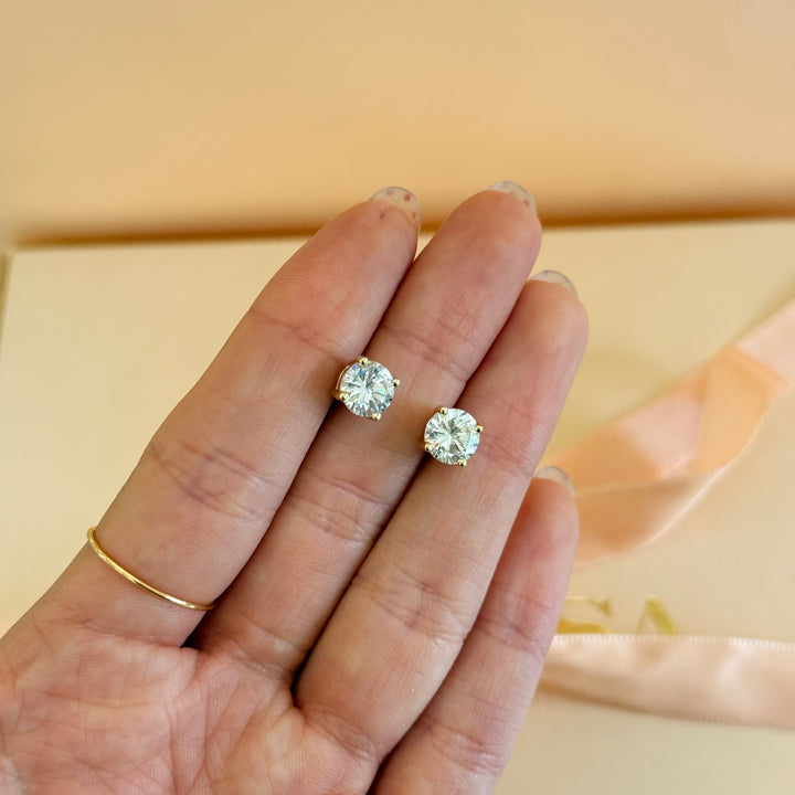 Medium size zircone solitaire gold plated earrings