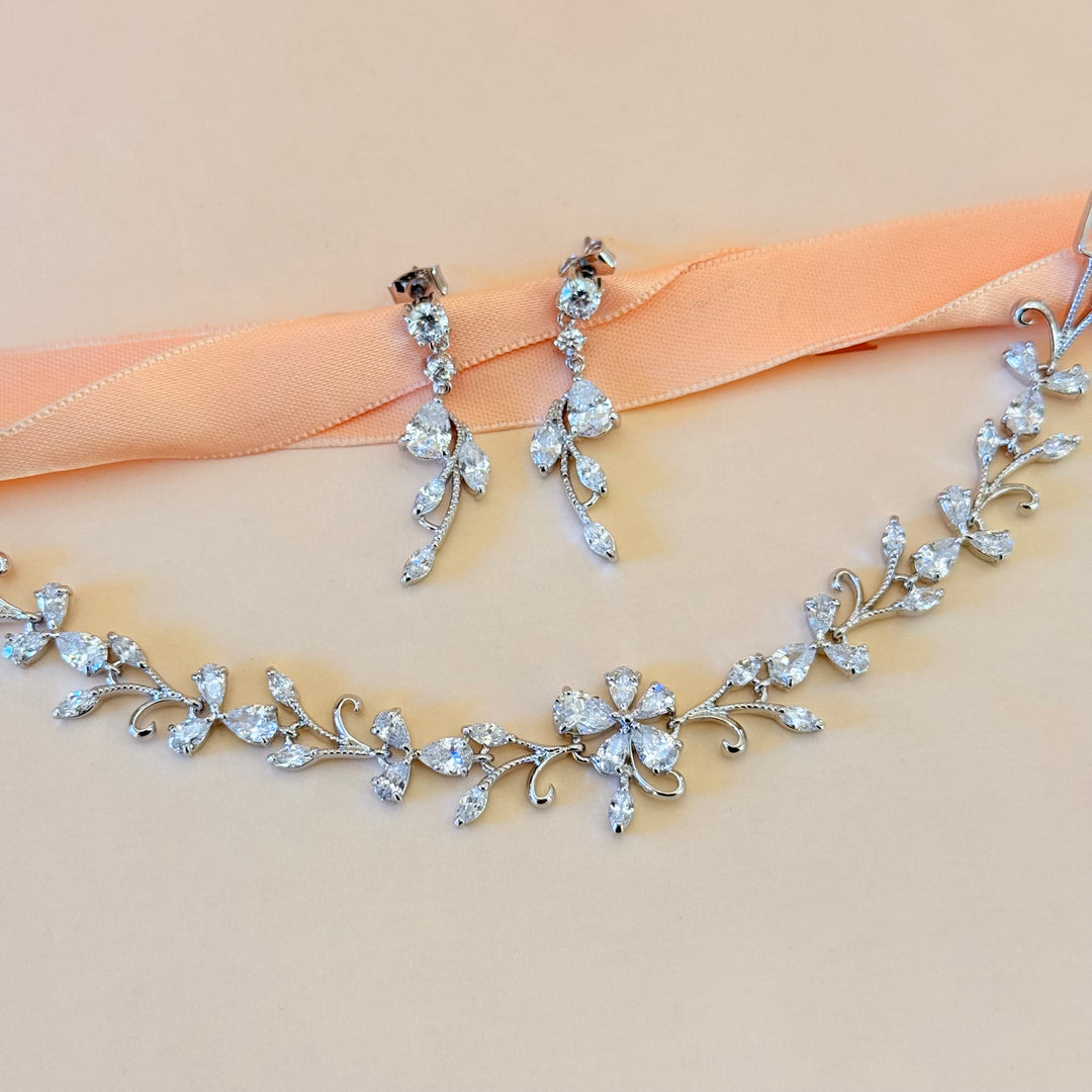 Teardrop and marquise zircone silver earrings and bracelet