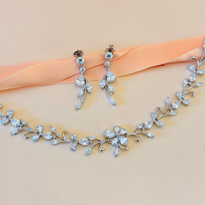 Teardrop and marquise zircone silver earrings and bracelet