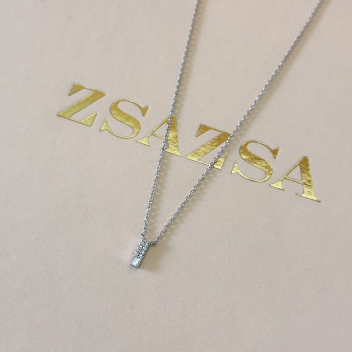 Dainty zircons silver pendant