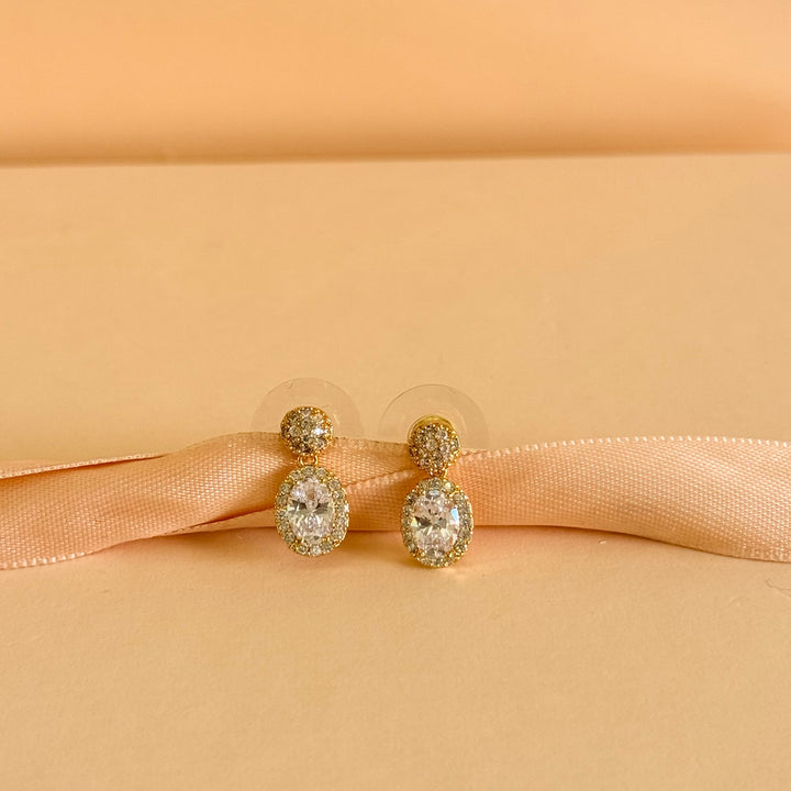 Round and oval dangle zircone gold plated earrings