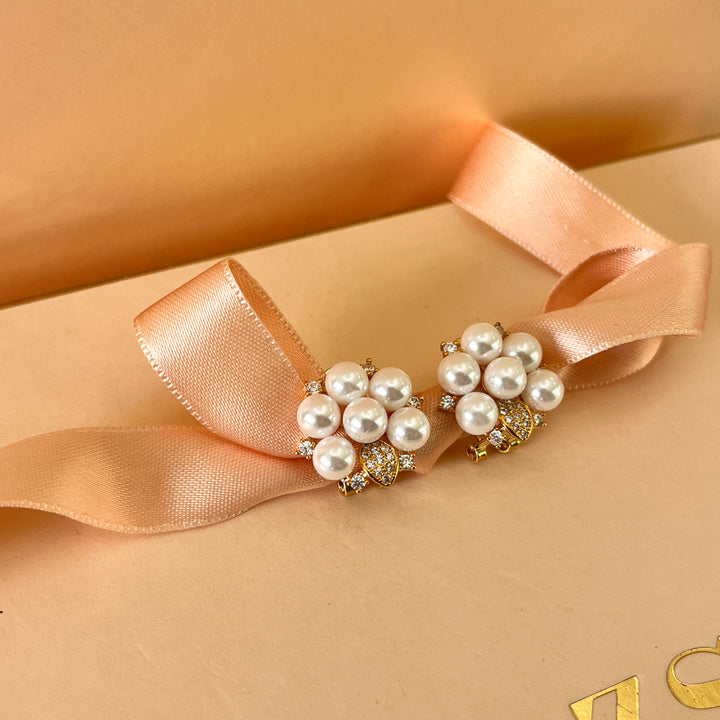 Zircone and white pearls gold plated earrings