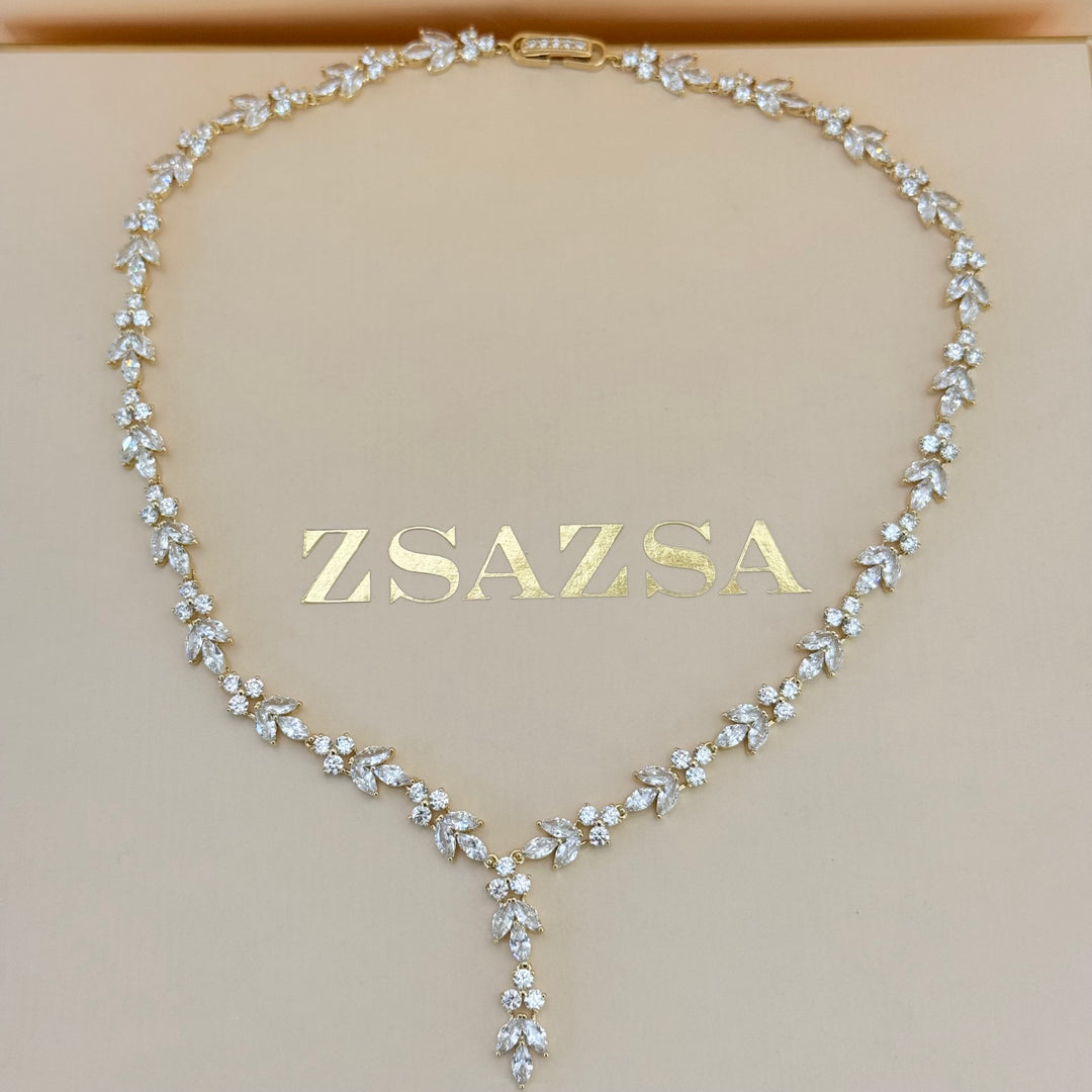 Round and marquise zircone gold plated set