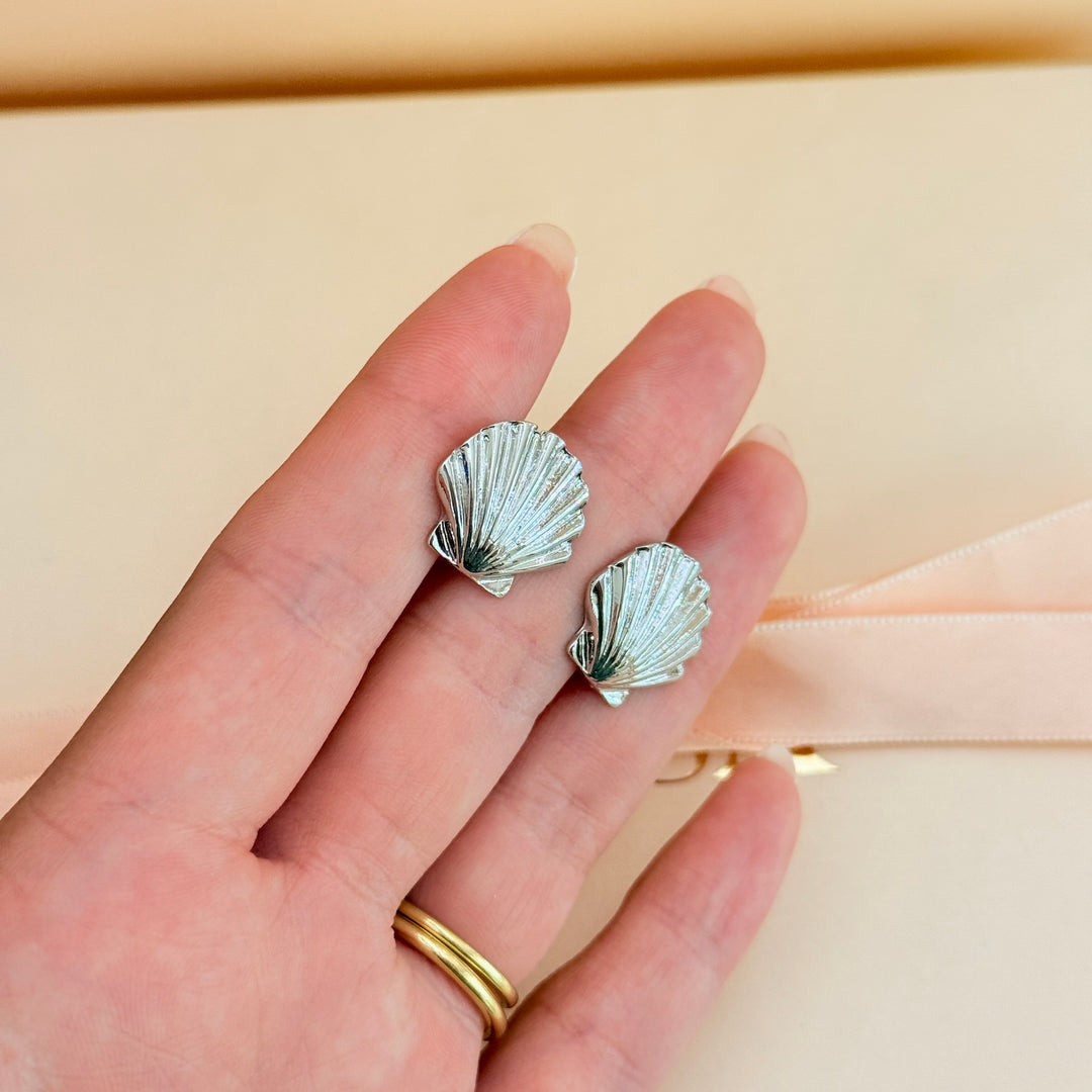 Plain shell silver clip on earrings