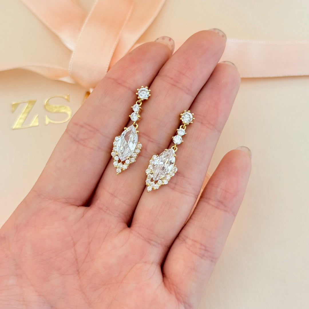 Round and marquise zircone gold plated earrings