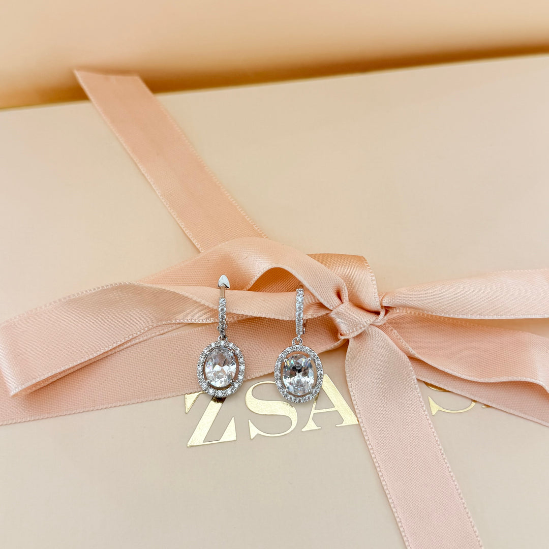 Oval zircone silver earrings and bracelet