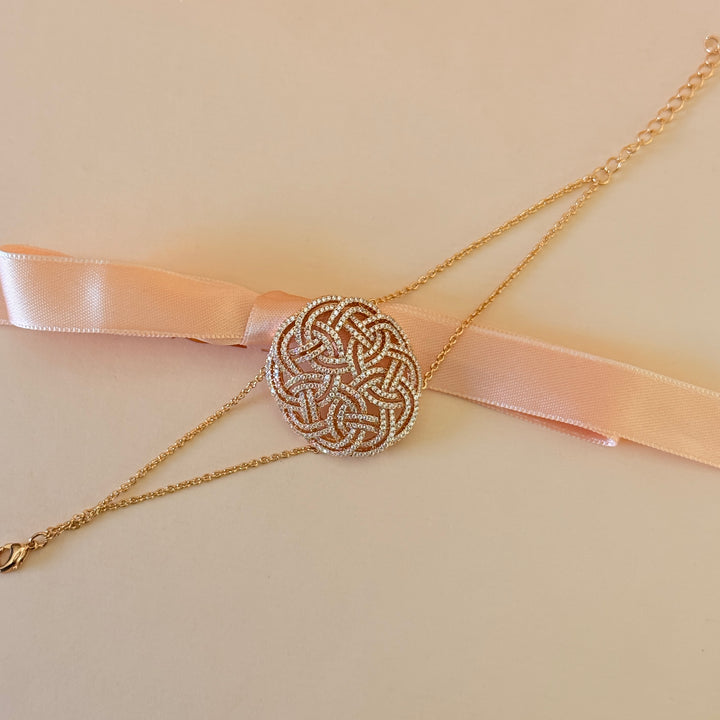 Zircone twisted in the middle gold plated bracelet