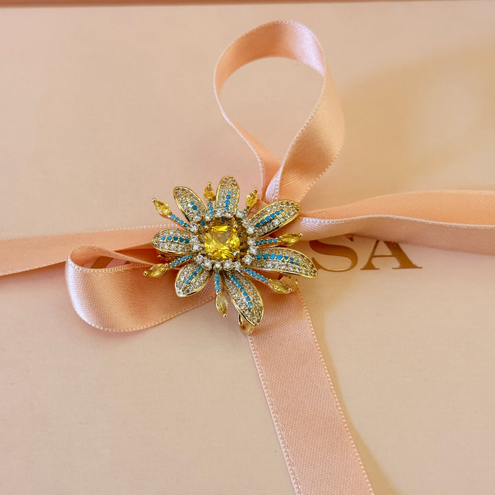 Yellow and turquoise zircone gold plated brooch