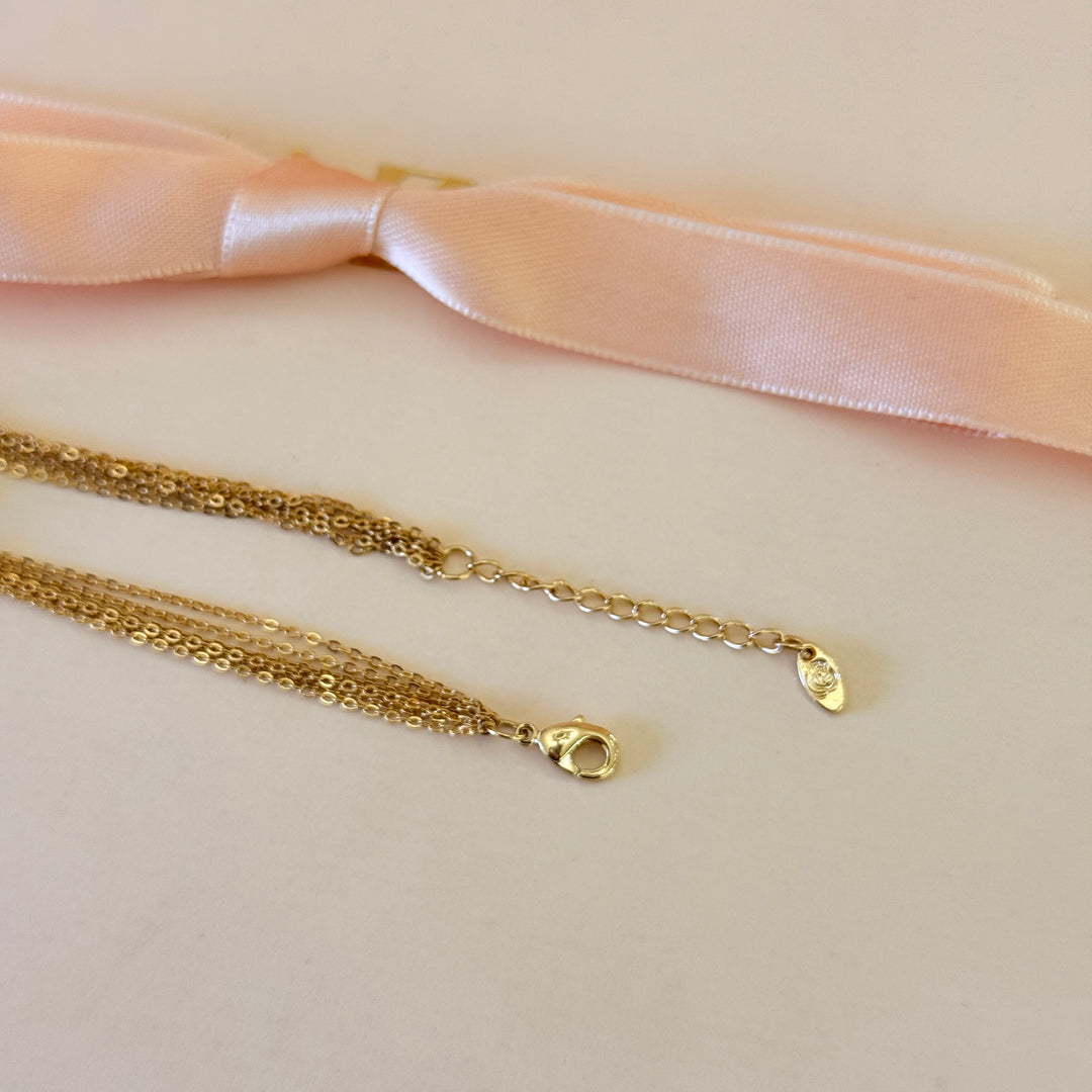 Zircone twisted round in the middle gold plated bracelet